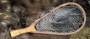 Net #181 Has a Curly Mango handle that is 7” long.